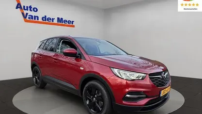 Rood, metallic lak Gebruikt 2021 Opel Grandland X Business Edition SUV | € 23.440 (Eerlijke prijs)