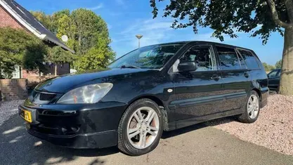 Zwart Gebruikt 2007 Mitsubishi Lancer Intense Stationwagen | € 1.999 (Goede deal)