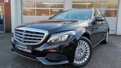 Occasion Mercedes C180 Prestige 157 PK (115 kW) 2014 Zwart Stationwagen
