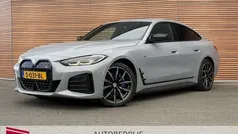 Grijs, metallic lak Gebruikt 2022 BMW i4 Comfort Edition Sedan | € 46.500 (Super prijs)