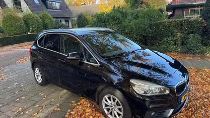 Zwart (metallic) Gebruikt 2016 BMW 216 Active Tourer Executive MPV | € 6.995 (Eerlijke prijs)