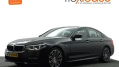 Grijs metallic Gebruikt 2018 BMW 520 M Sport Sedan | € 26.900 (Goede deal)