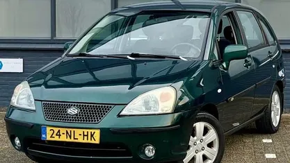 Groen (metallic) Occasion 2003 Suzuki Liana GLX Hatchback | € 1.750 (Eerlijke prijs)