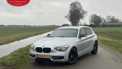 Grijs Occasion 2012 BMW 120 Basis Hatchback | € 6.750 (Eerlijke prijs)