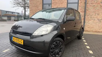 Occasion Daihatsu Sirion 69 PK (50 kW) 2012 Zwart Hatchback