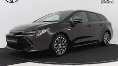Bruin Gebruikt 2021 Toyota Corolla Executive Stationwagen | € 25.945 (Eerlijke prijs)