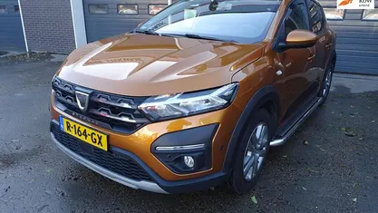 Oranje Gebruikt 2021 Dacia Sandero Comfort Hatchback | € 14.250 (Eerlijke prijs)