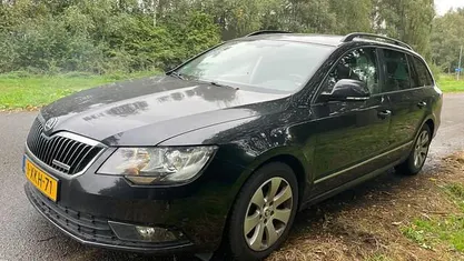 Occasion Skoda Superb Business Line 105 PK (77 kW) 2014 Zwart Stationwagen
