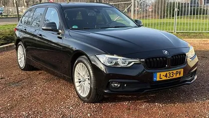 Zwart Occasion 2018 BMW 318 Stationwagen | € 11.750 (Eerlijke prijs)