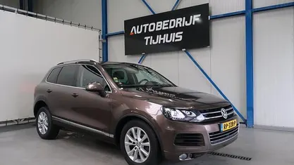 Bruin Occasion 2012 VW Touareg SUV | € 9.950 (Goede deal)