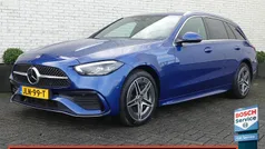 Blauw (metallic) Gebruikt 2022 Mercedes C300 AMG line Stationwagen | € 35.900 (Eerlijke prijs)
