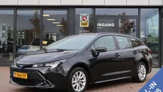 Zwart Gebruikt 2023 Toyota Corolla Hybrid Active Stationwagen | € 23.950 (Goede deal)