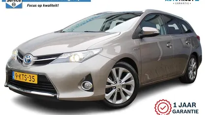 Occasion Toyota Auris Hybrid 2013 Bruin Stationwagen