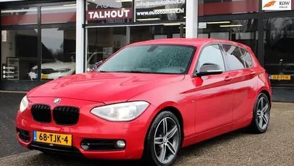 Rood Gebruikt 2012 BMW 118 Sport Line Hatchback | € 5.950 (Goede deal)
