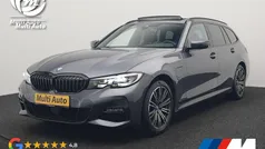 Grijs Gebruikt 2021 BMW 320e M Sport Stationwagen | € 29.430 (Eerlijke prijs)