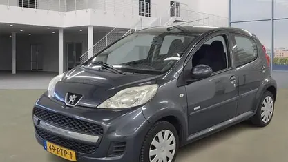 Occasion Peugeot 107 68 PK (50 kW) 2011 Grijs (metallic) Hatchback