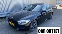 Zwart, metallic lak Gebruikt 2014 BMW M135 Executive Hatchback | € 18.950 (Goede deal)
