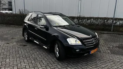 Zwart (metallic) Occasion 2006 Mercedes 320 SUV | € 6.999 (Eerlijke prijs)
