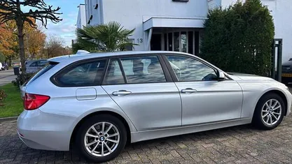 Grijs (metallic) Occasion 2014 BMW 316 Stationwagen | € 6.900 (Super prijs)