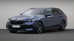 Blauw Gebruikt 2025 BMW 550e M Sport Stationwagen | € 94.880 (Super prijs)