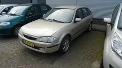 Beige, metallic lak Gebruikt 1999 Mazda 323 Hatchback | € 895 (Eerlijke prijs)