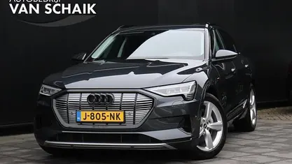 Grijs Occasion 2020 Audi e-tron Business SUV | € 24.850 (Eerlijke prijs)