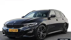 Zwart Gebruikt 2021 BMW 320 Executive Stationwagen | € 28.450 (Goede deal)