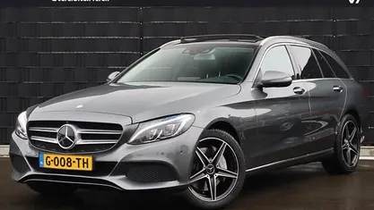 Grijs (metallic) Occasion 2016 Mercedes C400 Prestige Stationwagen | € 25.950 (Eerlijke prijs)
