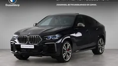 Blauw Gebruikt 2023 BMW X6 M50 Executive SUV | € 109.950 (Goede deal)