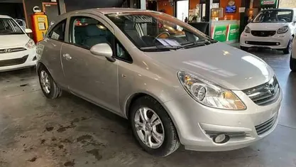 Occasion Opel Corsa Enjoy 88 PK (64 kW) 2009 Zilver Sedan
