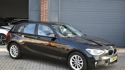 Zwart Gebruikt 2015 BMW 118 Executive Hatchback | € 7.950 (Eerlijke prijs)