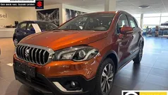 Oranje, metallic lak Gebruikt 2021 Suzuki SX4 S-Cross Style SUV | € 21.945 (Eerlijke prijs)
