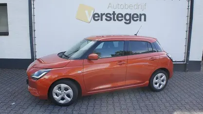 Oranje Gebruikt 2024 Suzuki Swift Hatchback | € 22.950 (Eerlijke prijs)