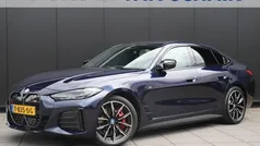 Blauw Gebruikt 2023 BMW i4 Executive Sedan | € 58.799 (Eerlijke prijs)