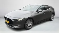 Machine grey Gebruikt 2024 Mazda 3 Homura-Line Hatchback | € 27.475 (Eerlijke prijs)