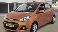 Oranje (metallic) Gebruikt 2014 Hyundai i10 Comfort Hatchback | € 7.750 (Eerlijke prijs)
