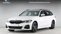 Wit Gebruikt 2021 BMW 320e Executive Stationwagen | € 31.900 (Eerlijke prijs)