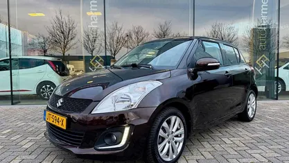 Bruin Gebruikt 2015 Suzuki Swift Style Hatchback | € 8.445 (Eerlijke prijs)