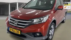 Rood (metallic) Gebruikt 2014 Honda CR-V Executive SUV | € 19.750 (Eerlijke prijs)