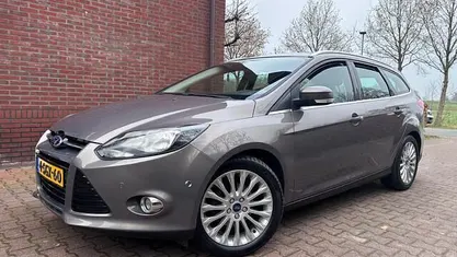 Bruin (metallic) Gebruikt 2013 Ford Focus Titanium Stationwagen | € 3.499 (Goede deal)