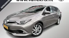 Bruin Gebruikt 2015 Toyota Auris Hybrid Stationwagen | € 14.440 (Eerlijke prijs)