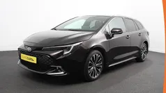 Bruin Gebruikt 2024 Toyota Corolla Hybrid Stationwagen | € 29.890 (Super prijs)