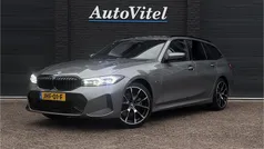 Grijs Gebruikt 2022 BMW 330e M Sport Stationwagen | € 37.245 (Eerlijke prijs)