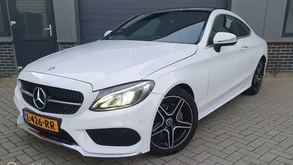 Wit Gebruikt 2016 Mercedes C220 AMG line Coupé | € 24.999 (Eerlijke prijs)