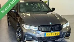 Grijs Gebruikt 2021 BMW 330 Executive Stationwagen | € 33.950 (Eerlijke prijs)