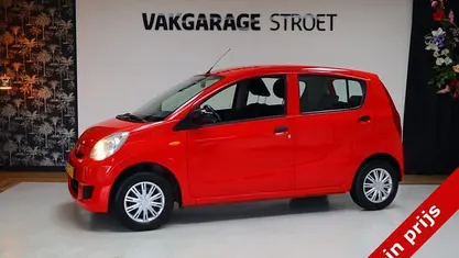 Occasion Daihatsu Cuore 69 PK (50 kW) 2008 Rood Hatchback
