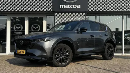 Machine gray metallic (46g) Gebruikt 2023 Mazda CX-5 Homura-Line SUV | € 37.440 (Eerlijke prijs)