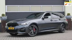 Grijs (metallic) Gebruikt 2020 BMW 330e M Sport Stationwagen | € 29.900 (Eerlijke prijs)