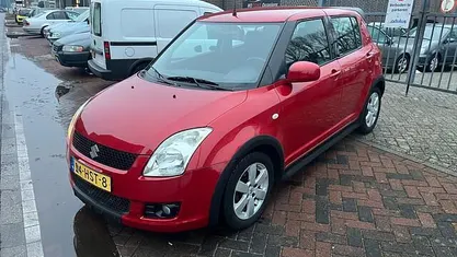 Rood (metallic) Occasion 2009 Suzuki Swift Exclusive Hatchback | € 3.900 (Eerlijke prijs)