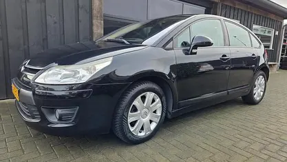 Zwart (metallic) Occasion 2009 Citroën C4 Prestige Hatchback | € 1.295 (Eerlijke prijs)